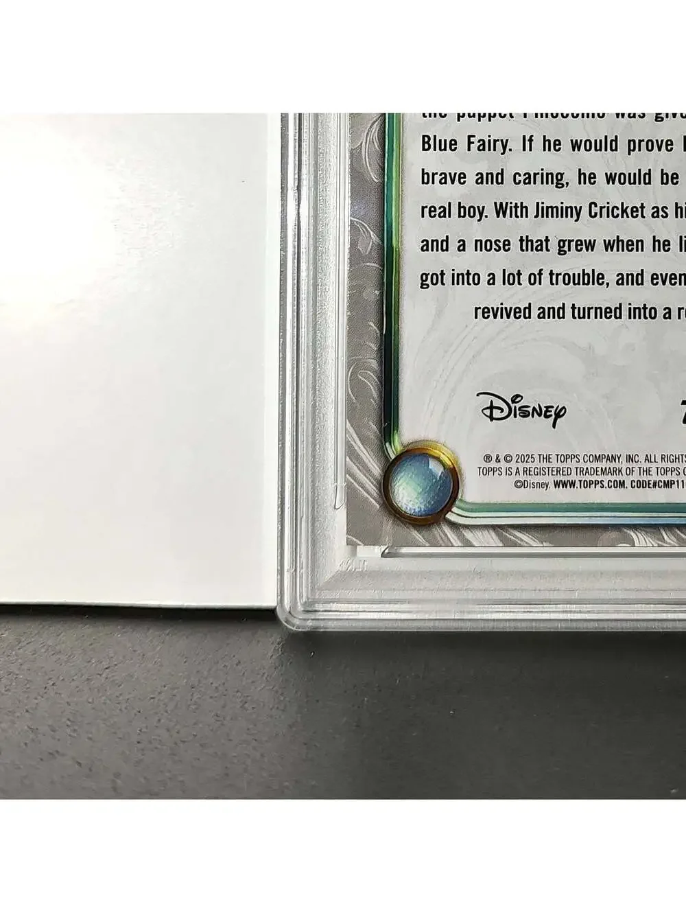 Pinocchio 2025 Topps Disney Wonder #7 Winter Variant Card Pinocchio PSA 8
